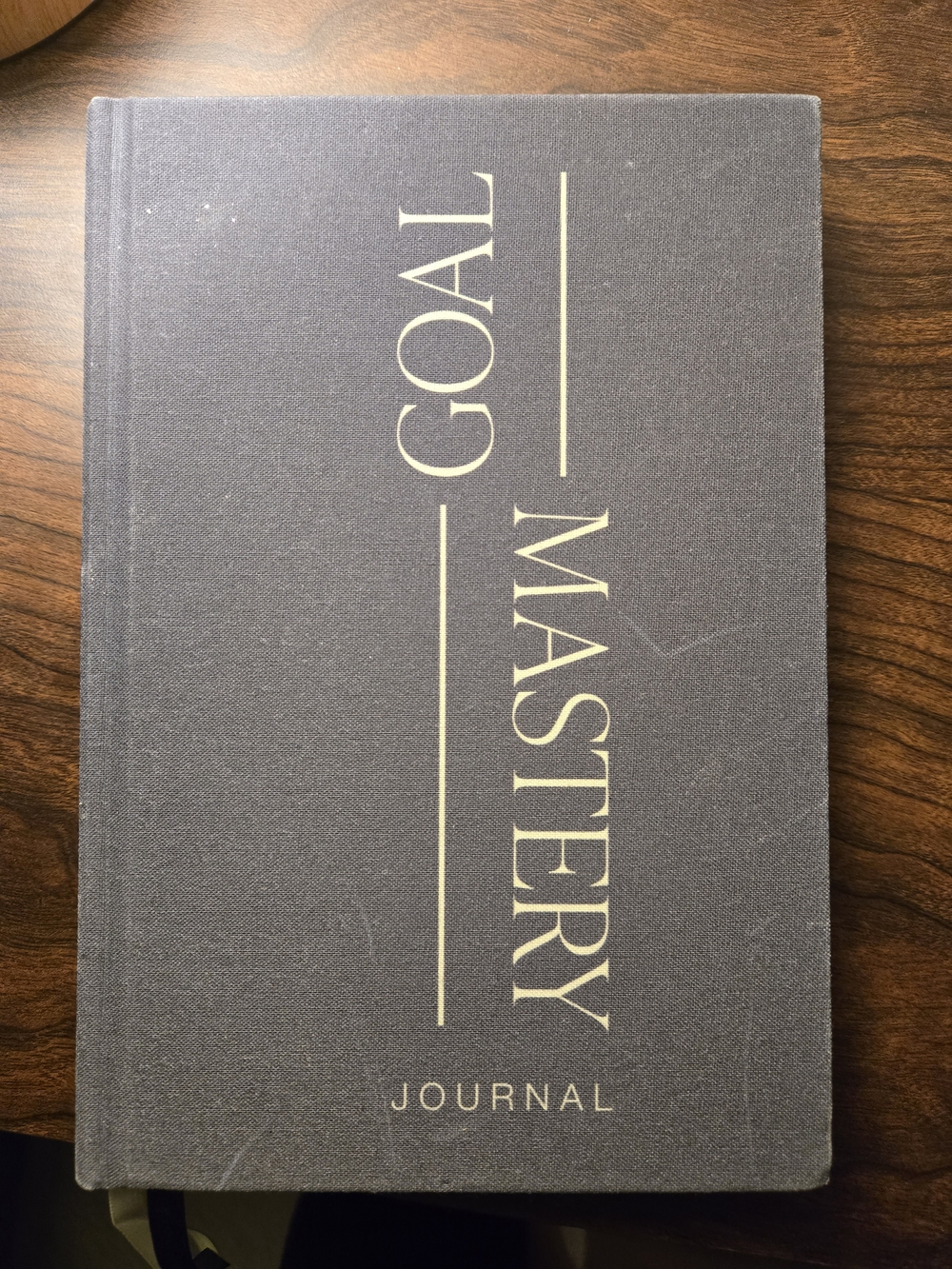 Goal Mastery Hardcover Journal — Charcoal Cover with Cream Text